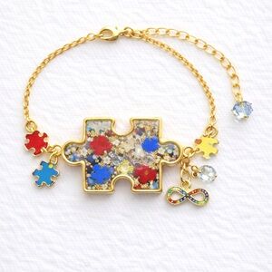 Gold Puzzle Piece Charm Bracelet